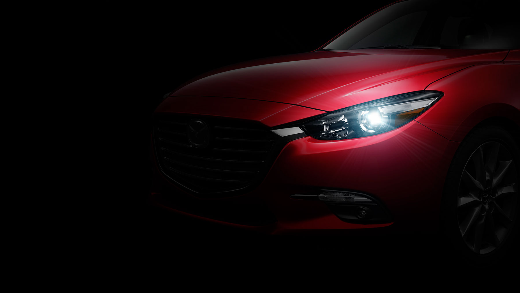 Mazda 3 2018 sedán en México color rojo faros frontales LED