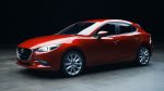 Mazda 3 2018 hatchback en México color rojo de perfil frente izquierdo