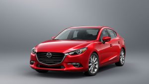 Mazda 3 2018 sedán en México color rojo fondo gris