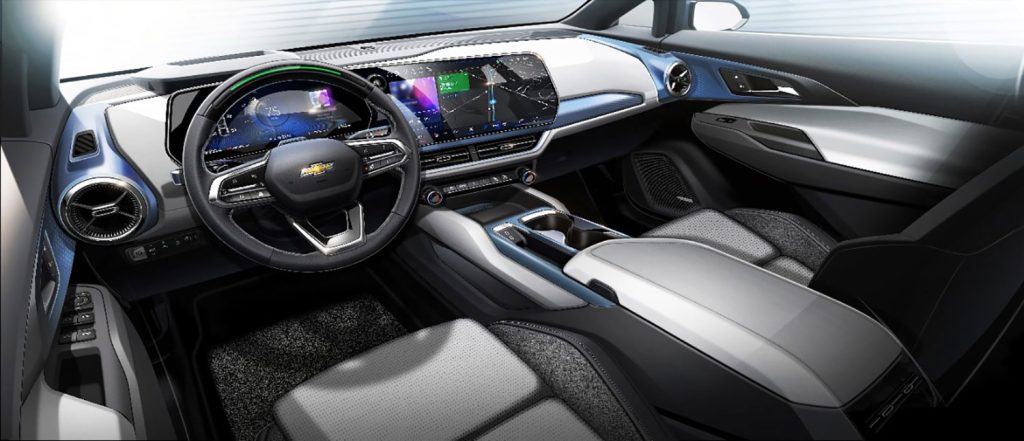 Chevrolet Equinox EV 2024 diseño interior con pantalla y asientos bicolor