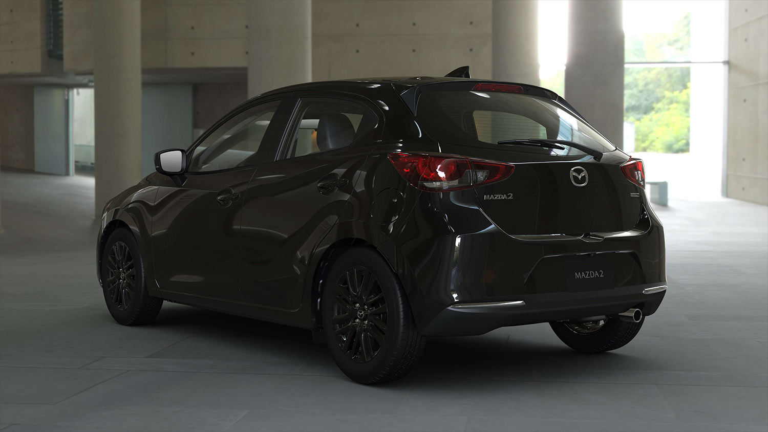 Mazda 2 hatchback 2023 en México Carbon Edition MHEV - color negro parte trasera