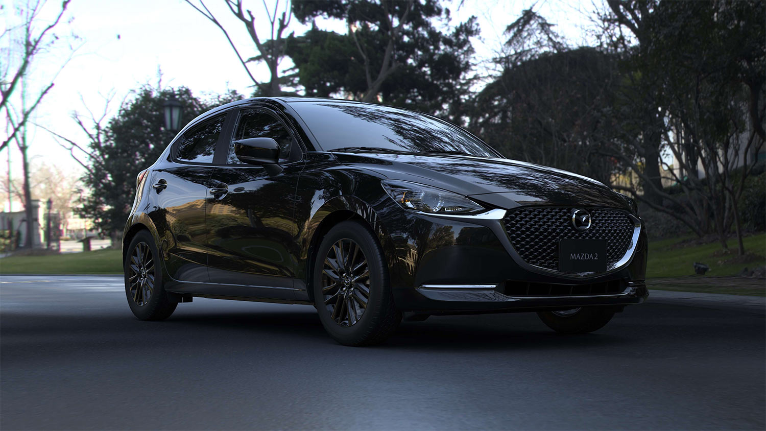 Mazda 2 hatchback 2023 en México Carbon Edition MHEV - parrilla frontal, rines color negro