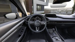 Mazda 3 Sedán 2023 en México interiores palanca de velocidades versión automática y volante multifunciones