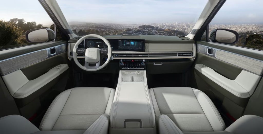 Hyundai Santa Fe 2024 diseño interior moderno con amplios espacios - Asientos, volante, pantallas