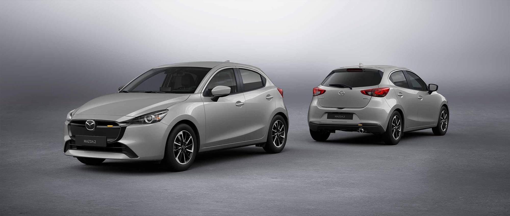 Mazda 2 Hatchback 2024 en México - color blanco aperlado, diseño exterior frontal y posterior