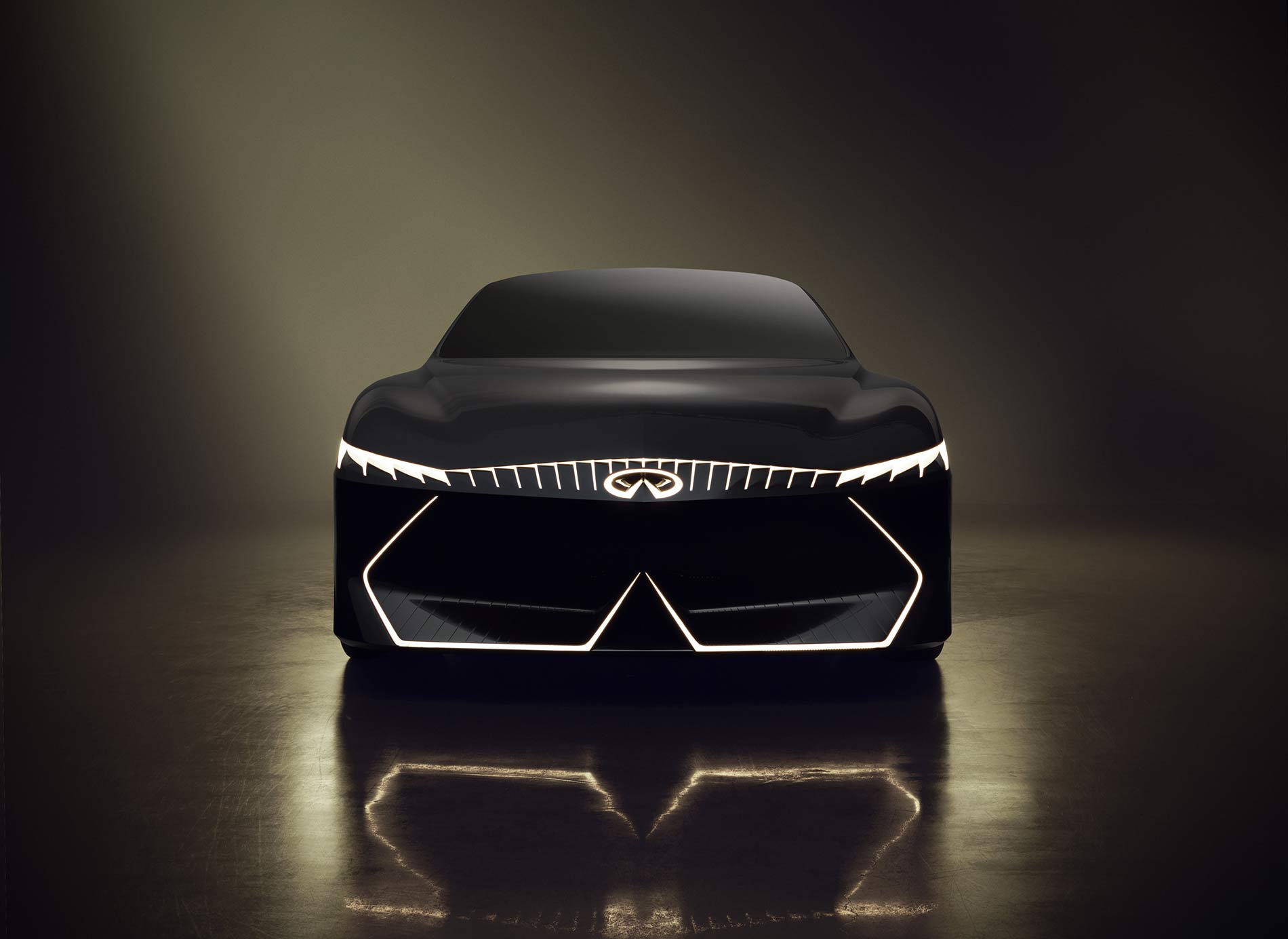 Infiniti Vision Qe concept - primer auto eléctrico de la marca - diseño exterior, parte frontal, parrilla iluminada, parachoques o defensa iluminada y faros LED