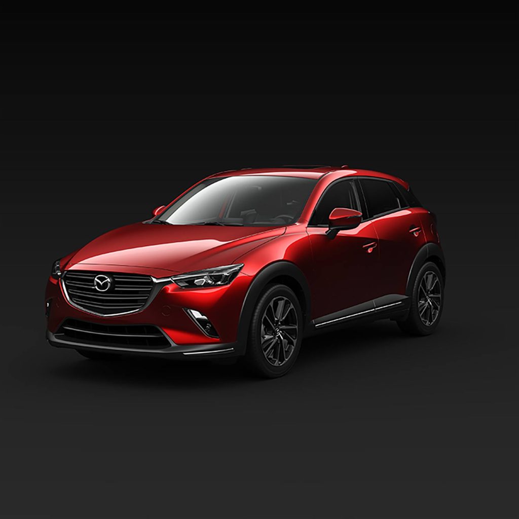 Mazda CX-3 2024 en México - diseño exterior - color rojo, de frente y lateral